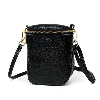 Premium leather crossbody bag with adjustable strap, multiple pockets, and sleek Korean-inspired style