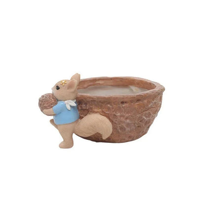 Cartoon squirrel-shaped succulent planter with drainage hole for healthy plant growth