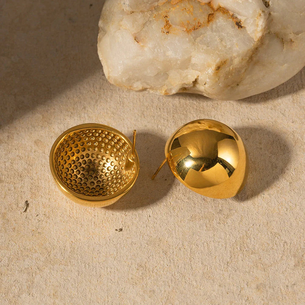 Elegant 18K gold-plated cutout earrings with a sleek hemispherical design, perfect for formal events and everyday wear.