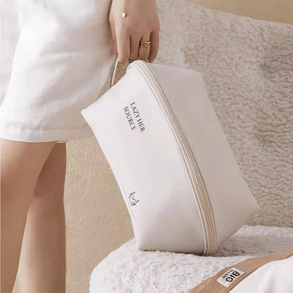 Compact travel underwear and lingerie organizer bag made of durable polyester for organized storage of bras, underwear, and socks while on the go.