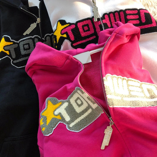 Women's hooded sweater with cozy cotton blend fabric and embroidered letter details for a stylish, casual look