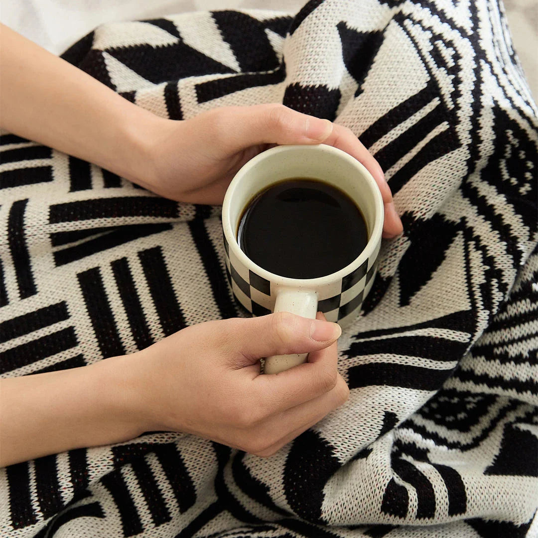 Cozy Geometric Cotton Blanket in Black and Gray with Vibrant Stripe Trim