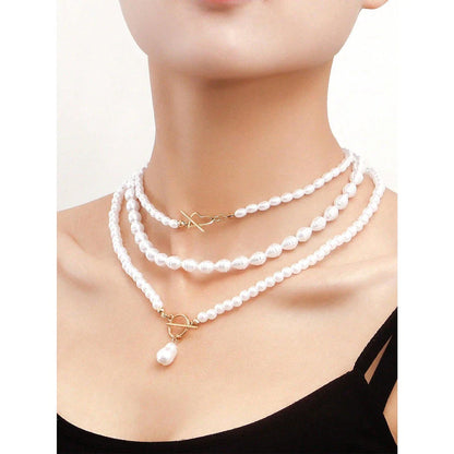 Elegant imitation pearl heart pendant necklace with lustrous bead chain and secure OT buckle closure