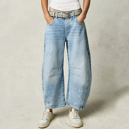 Trendha wide-leg summer pants in light blue, white, and black colors with a relaxed, stylish design