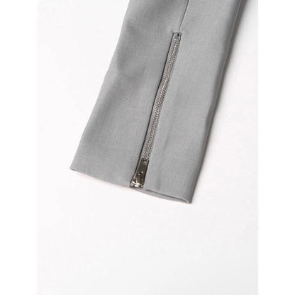 Stylish patchwork windbreaker trench coat with notched collar, button detailing, and flattering wide-waisted cut