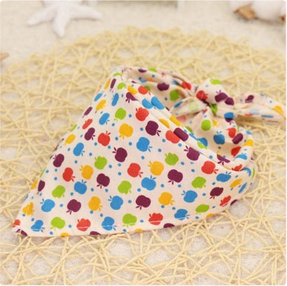 Adorable Cartoon Patterned Triangular Dog Scarf in vibrant colors, perfect for keeping your pup warm and stylish