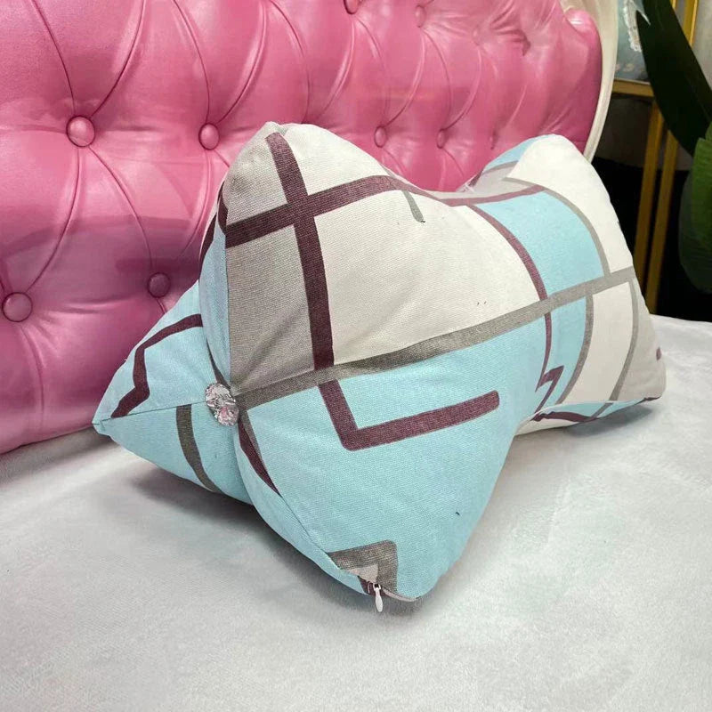 Multifunctional sofa cushion with vibrant cartoon-inspired designs, including flowers, plants, and cloud patterns, adding a playful touch to any living space.