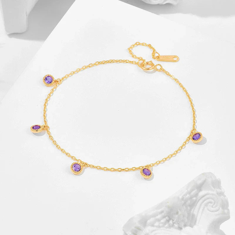 Luxury 925 sterling silver bracelet with elegant green olive stones and geometric patterns, inspired by Japanese design.