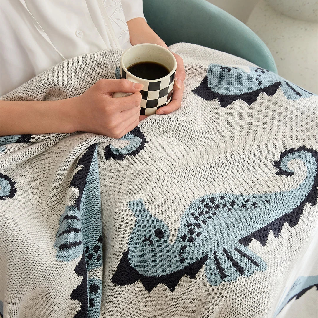 Cozy cotton blanket with cute sea horse design, perfect for relaxation and comfort