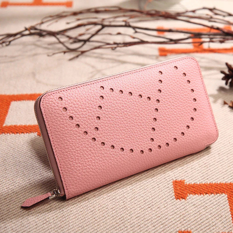 Premium cowhide leather clutch bag with lychee pattern design, featuring a medium-sized square shape and versatile style