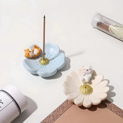 Elegant mini resin incense holder with cherry blossom, water lily, plum blossom, and daisy motifs for calming aromatherapy experience