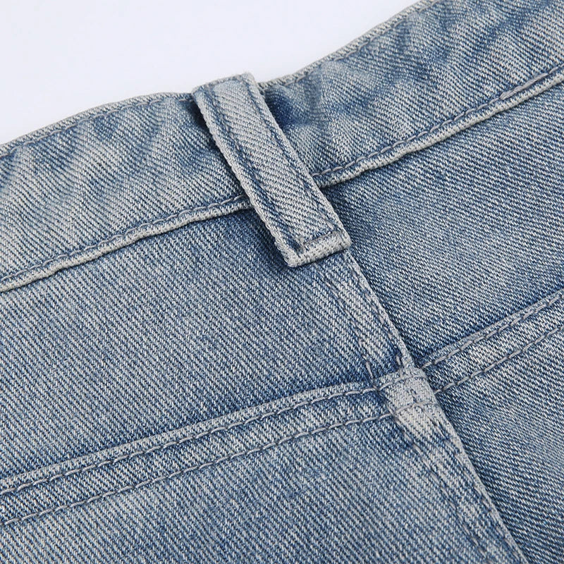 Premium embroidered high-rise straight leg denim jeans in a classic blue color