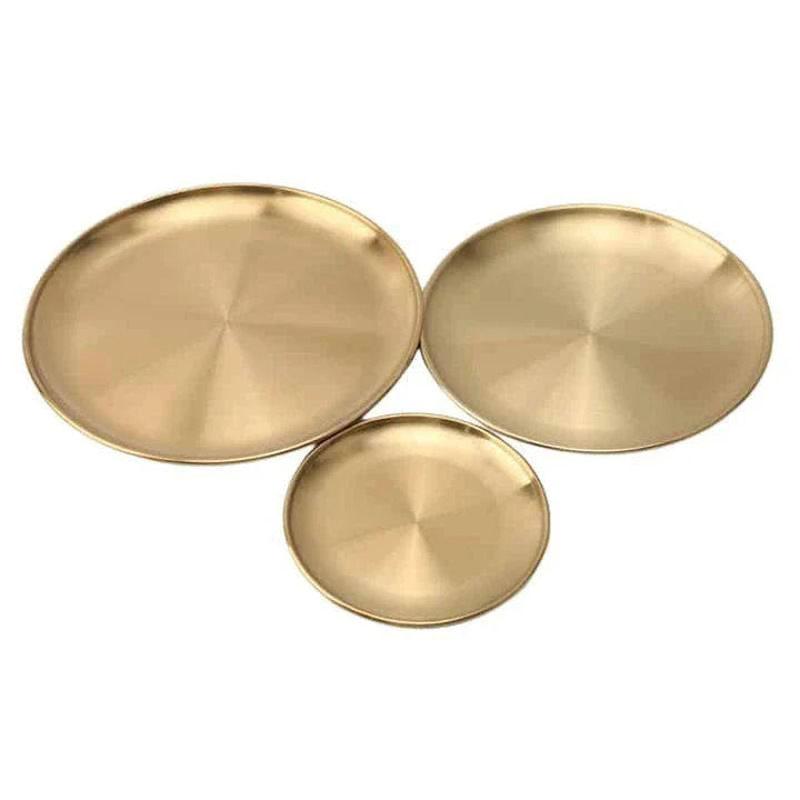 Elegant European-style round dinner plates made of premium stainless steel with a luxurious gold finish