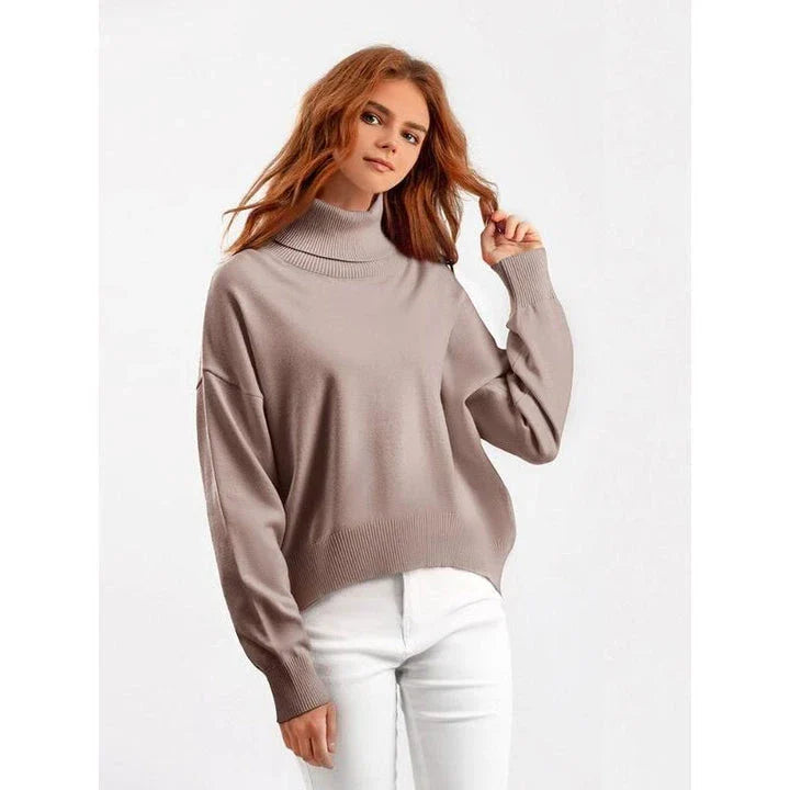 Chic and cozy oversized turtleneck sweater for women in a solid color, perfect for cold weather fashion and style