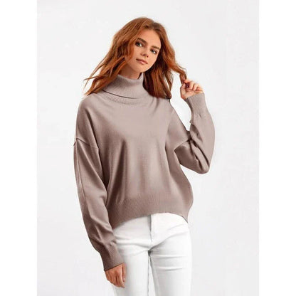 Chic and cozy oversized turtleneck sweater for women in a solid color, perfect for cold weather fashion and style