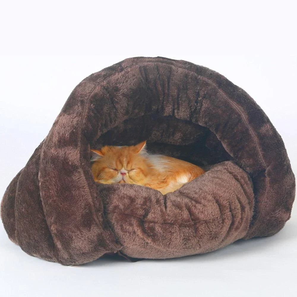 Cozy cat sleeping bag bed made of soft, plush coral fleece material for maximum comfort and relaxation