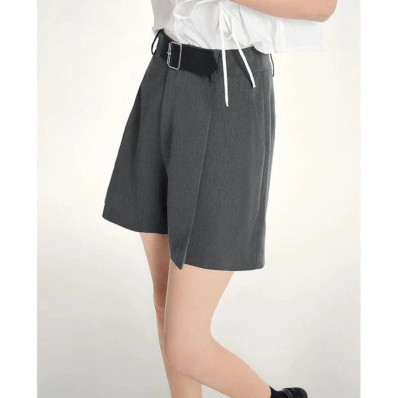 Elegant summer harem shorts for women with high-waist, loose fit, and subtle pleating detail