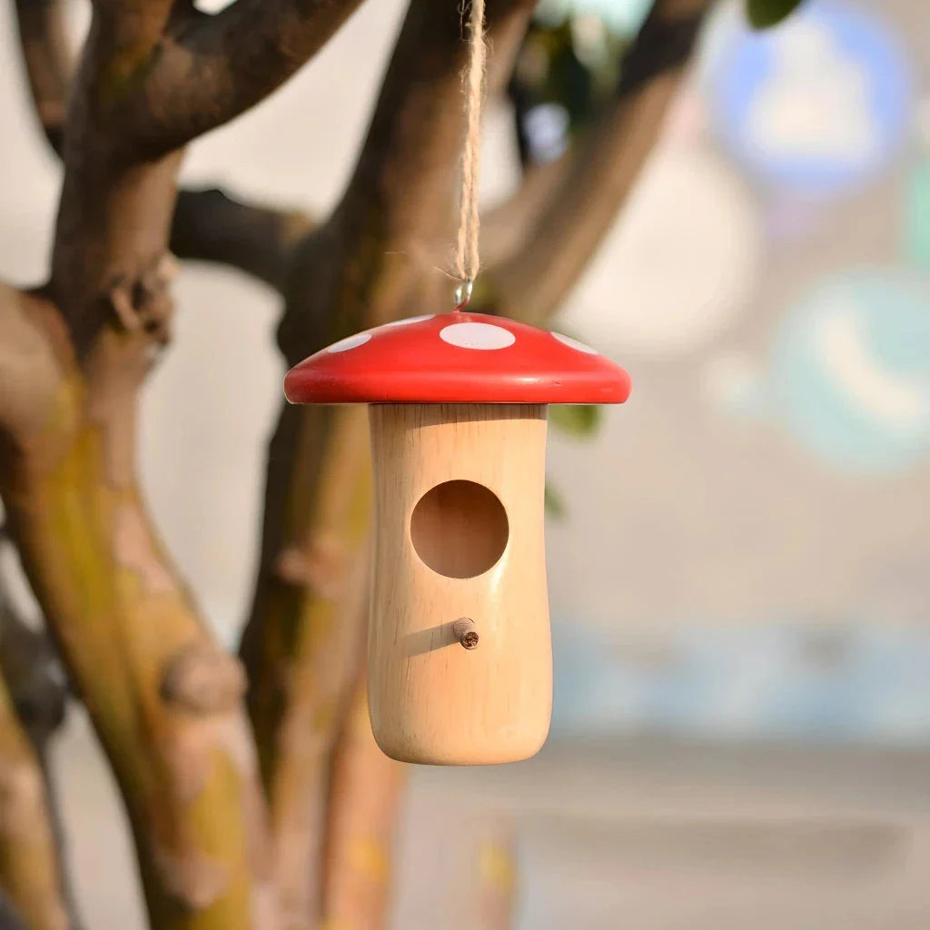 A decorative wooden hummingbird nest with a classic rustic design, perfect for attracting and providing a cozy retreat for hummingbirds in your outdoor garden.