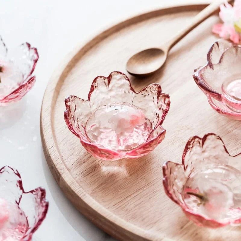 Handcrafted flower-shaped glass salad bowl in vibrant pink color, perfect for serving fresh greens, fruits, and more.