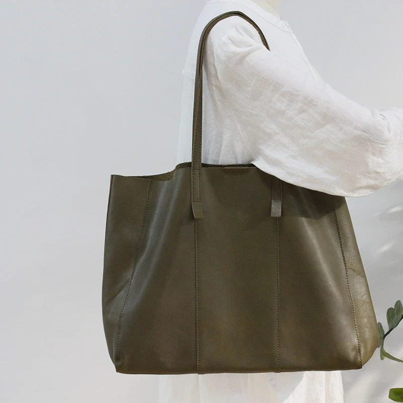 Premium leather handbag with multiple pockets and compartments for exceptional organization and style