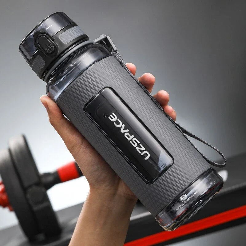Portable sports water bottle with wide mouth, tea infuser, and leak-proof design for active lifestyles