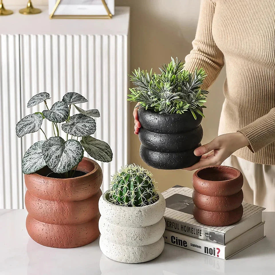 Modern minimalist cement flower pot with Nordic-inspired design, available in small and medium sizes for indoor and outdoor use