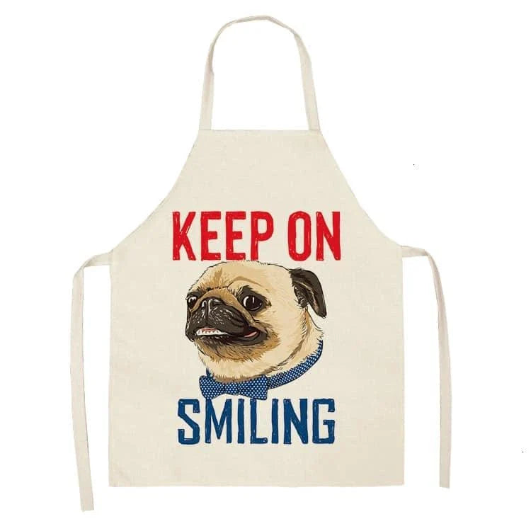 Charming pug-themed apron with a vibrant print, made of durable cotton and linen materials for practical kitchen use.