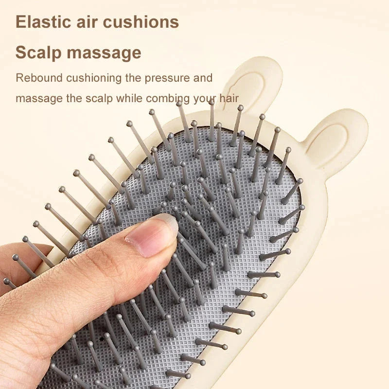 Portable heart-shaped scalp massage comb with airbag feature for curly hair and antistatic design