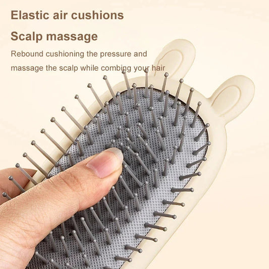 Portable heart-shaped scalp massage comb with airbag feature for curly hair and antistatic design