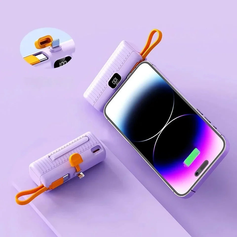 A compact, dual-port 30,000mAh power bank with built-in charging cables and fast charging capabilities.