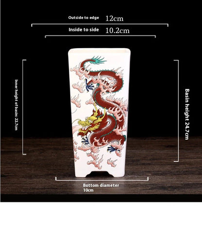 Elegant square ceramic planter in white with a Chinese-inspired design, suitable for indoor plants like asparagus fern and orchid.