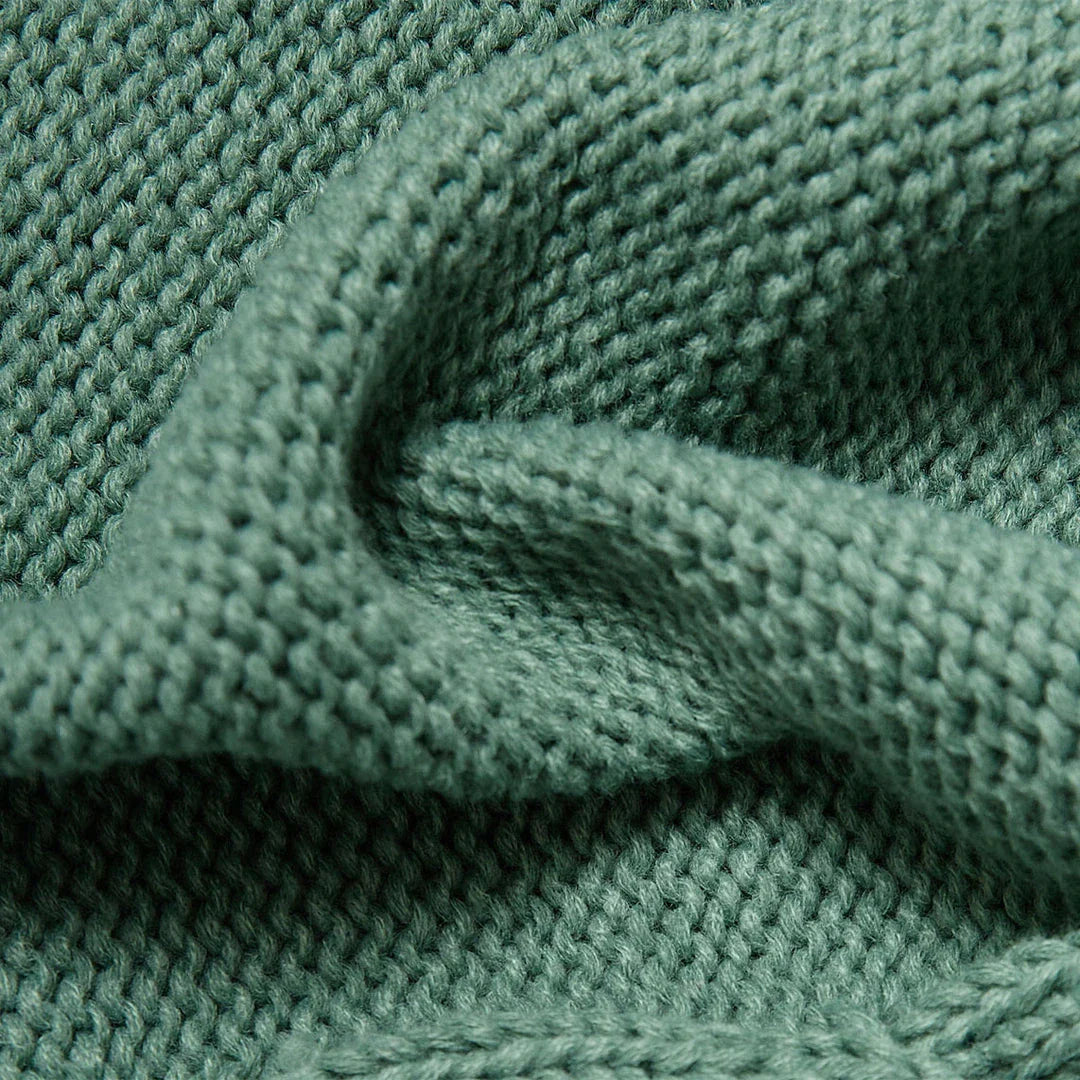 Cozy Nordic-inspired knit pillow cover with large twist design in multiple colors for stylish home decor