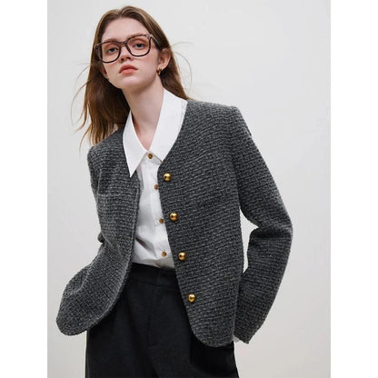 Sophisticated women's winter wool tweed jacket with stylish v-neck collar and single-breasted closure for a classic French look