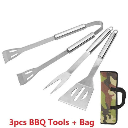 Stainless steel BBQ tool set with fork, tongs, and shovel for outdoor grilling and cooking