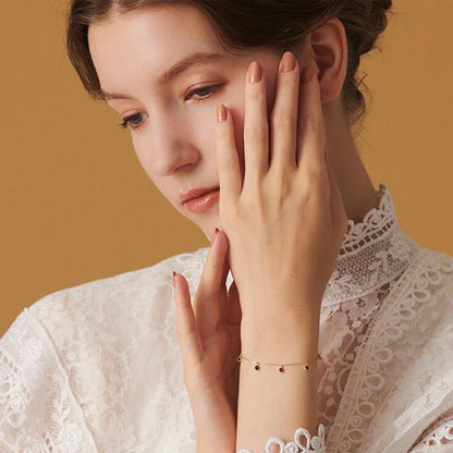 Luxury 925 sterling silver bracelet with elegant green olive stones and geometric patterns, inspired by Japanese design.