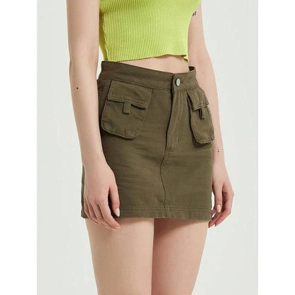 Chic green denim high-waist pencil skirt with convenient pockets, offering a flattering and versatile look for any occasion.