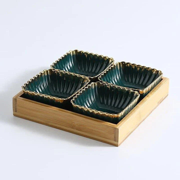 Elegant green and gold ceramic serving platter with a wood trim, perfect for hosting and elevating your dining experience.