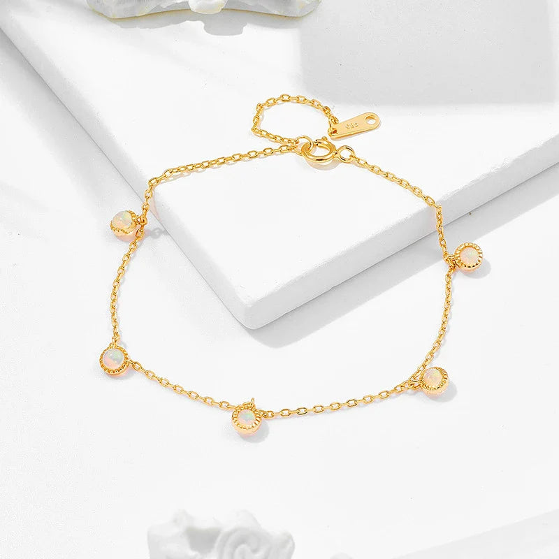 Luxury 925 sterling silver bracelet with elegant green olive stones and geometric patterns, inspired by Japanese design.