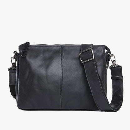 Premium cowhide leather crossbody bag with multiple interior pockets for organized, hands-free carrying