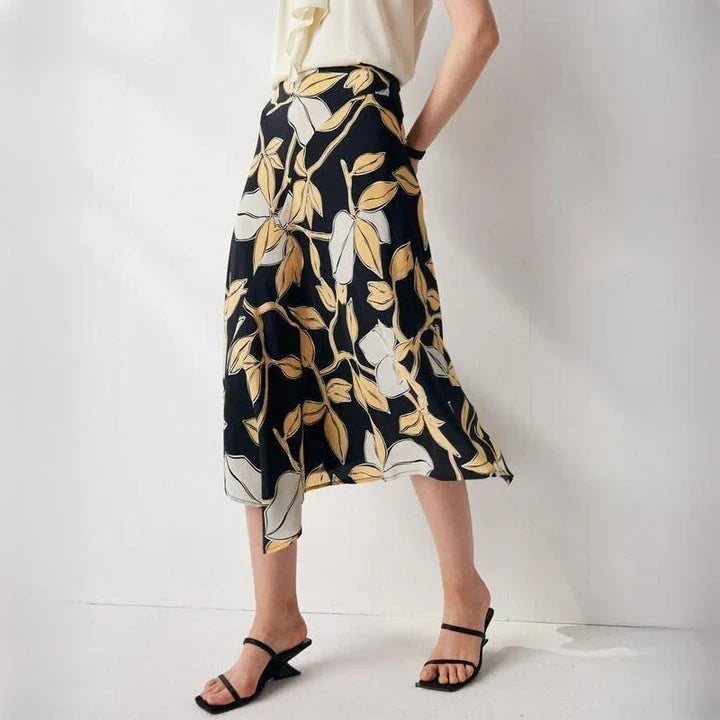Elegant floral silk A-line skirt with mid-calf length and asymmetrical decoration for timeless style