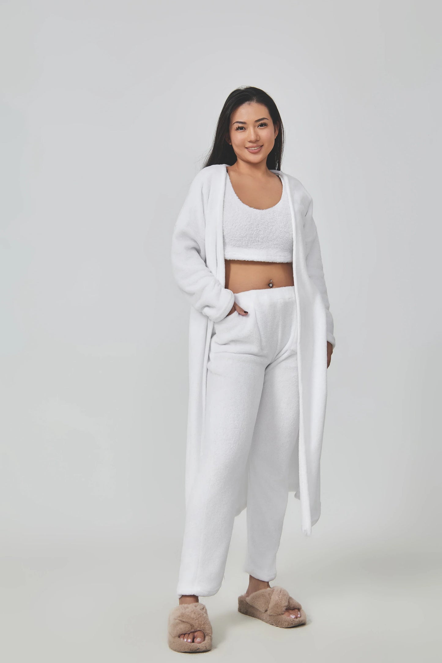 Cozy 3-piece loungewear set in pastel colors including crop top, wide-leg pants, and matching cardigan