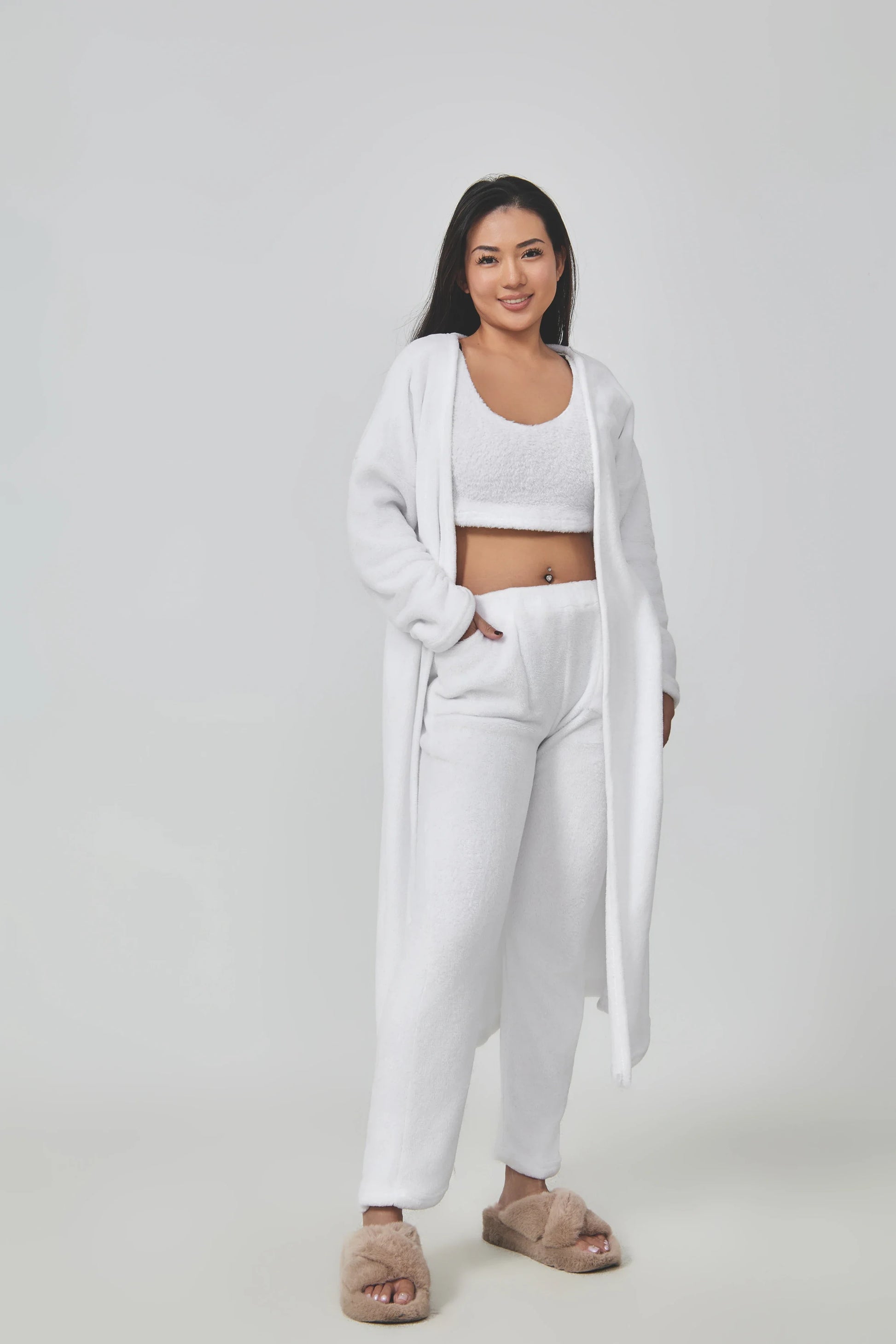Cozy 3-piece loungewear set in pastel colors including crop top, wide-leg pants, and matching cardigan