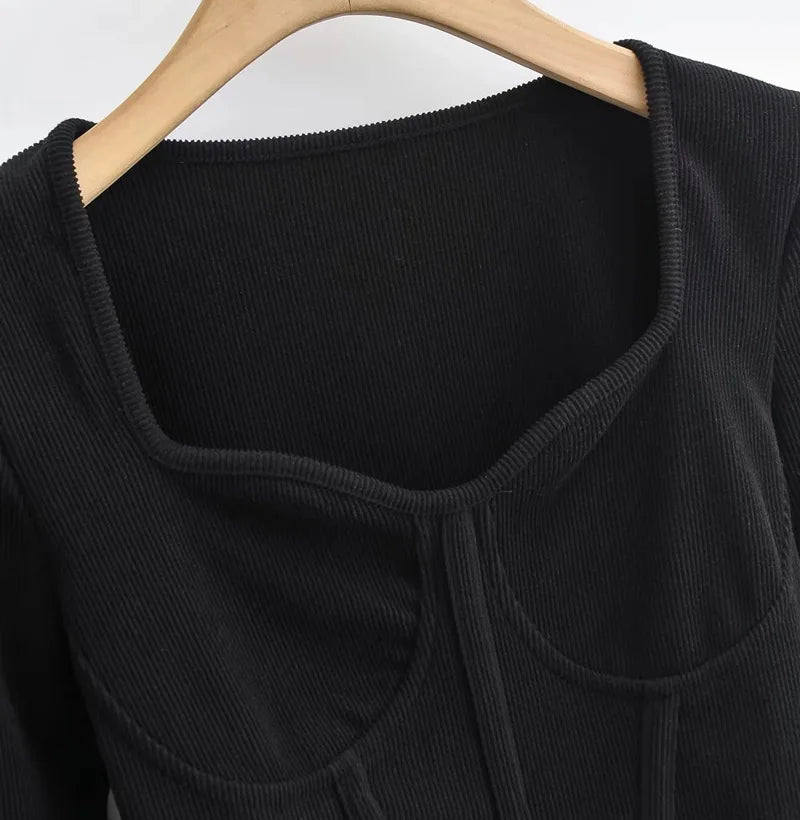 A stylish slim-fit short autumn top with an open waist design, made of premium polyester fabric with long sleeves and a square collar.