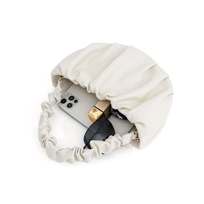 Luxurious Sheepskin Pleated Crossbody Bag in various colors - a stylish and functional everyday accessory for women