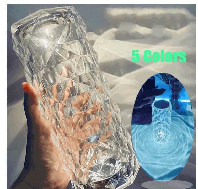 Elegant diamond-inspired crystal lamp with touch-sensitive dimming controls, providing adjustable ambient lighting for bedrooms and living spaces.