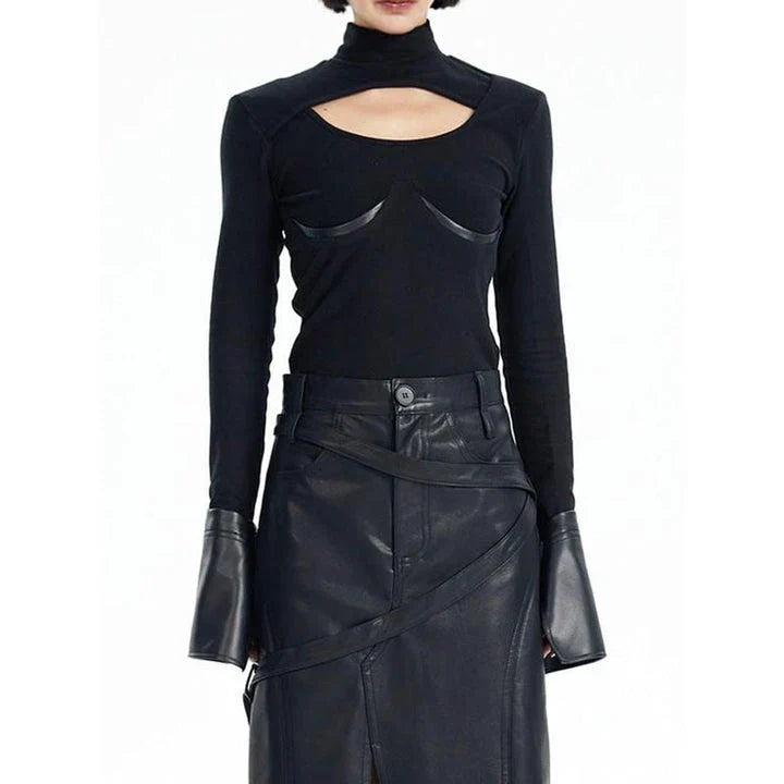 Stylish knit pullover with PU leather patchwork detail, offering a cozy and fashionable winter essential