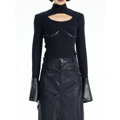 Stylish knit pullover with PU leather patchwork detail, offering a cozy and fashionable winter essential