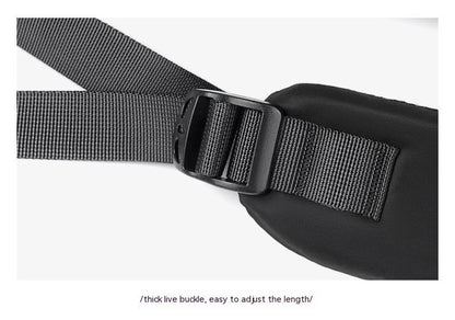 A large, simple, and stylish backpack made of durable nylon material with multiple compartments for organized storage and comfortable shoulder straps for easy carry.