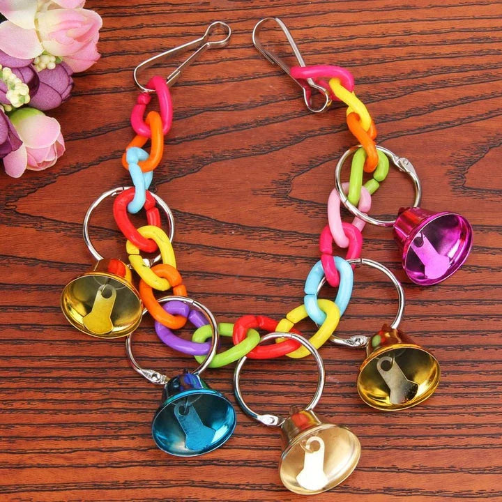 Hanging acrylic bird bells that sway and chime, attracting and entertaining backyard birds