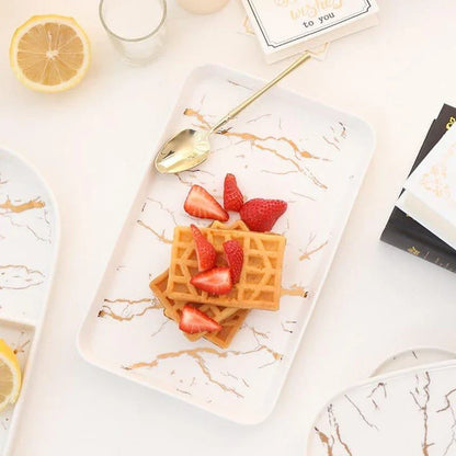 Elegant white marble-inspired ceramic plate with a sophisticated and timeless design